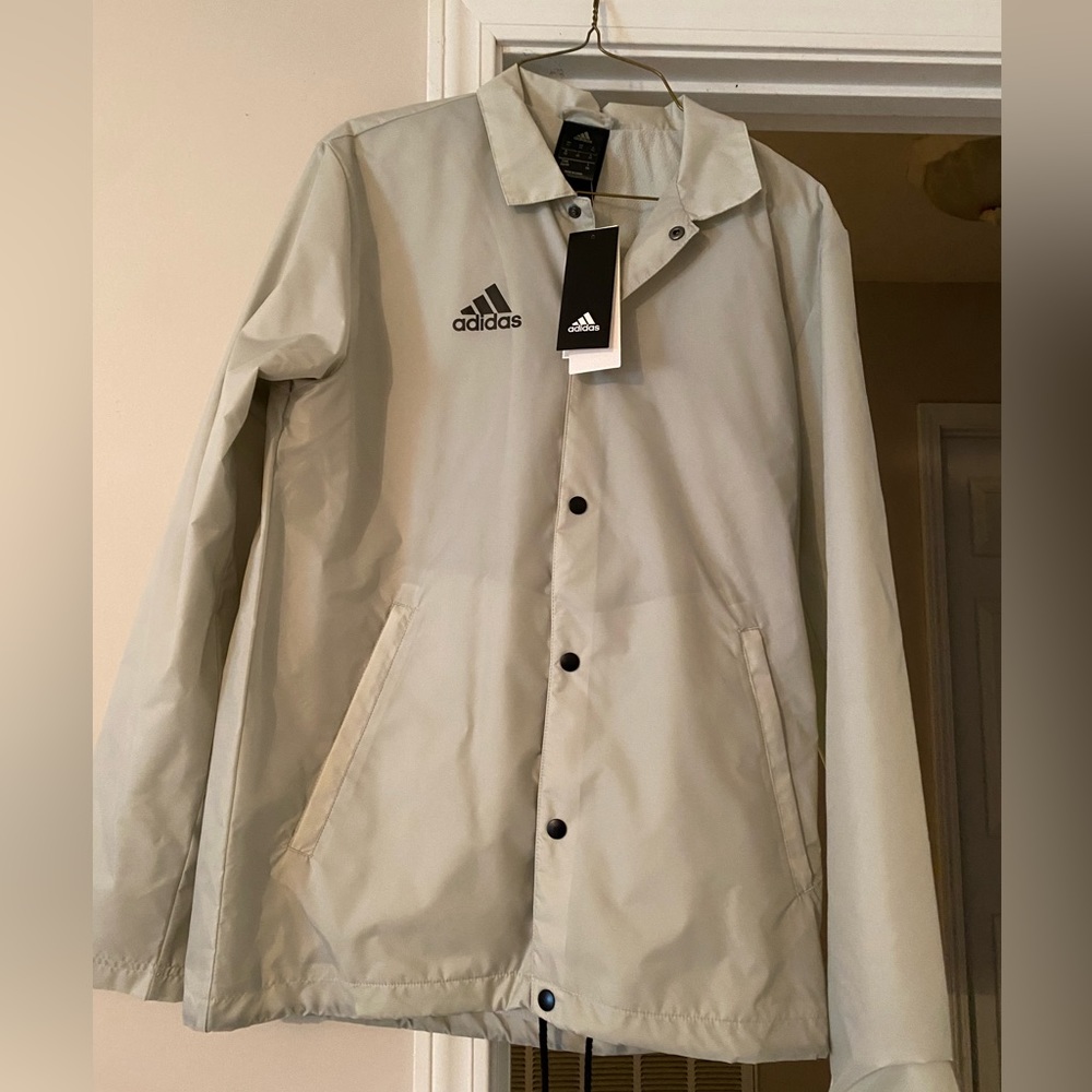 Adidas rain jacket. Adult XS, fits like a S. Light gray